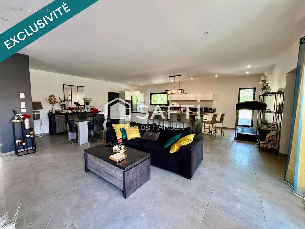 Photo 2 - Maison à SAINT-JULIEN-LES-ROSIERS