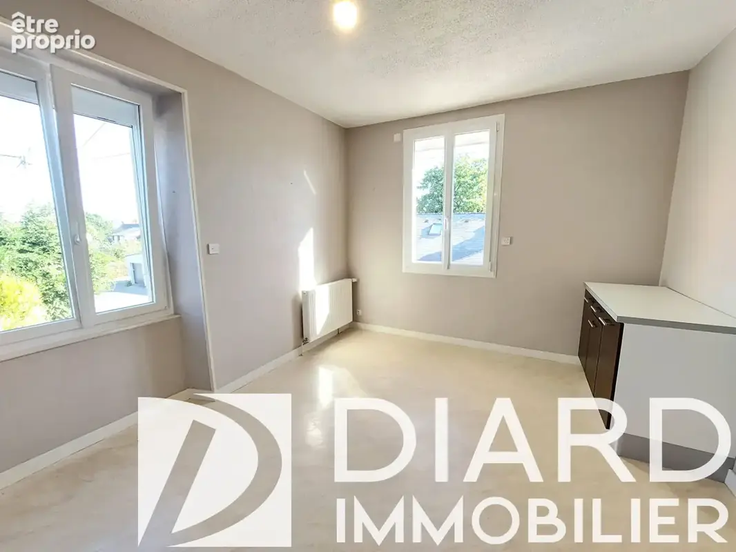 Maison 126 m² - Double garage + hangar - photo 4