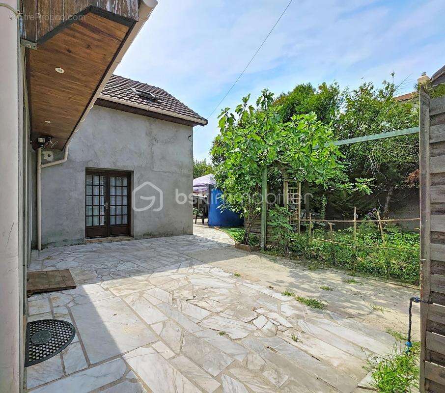 Maison familiale de 142 m² avec jardin - photo 2