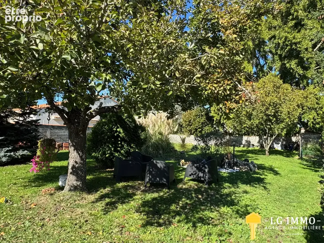 Maison de plain-pied avec jardin et garage en centre ville - photo 16