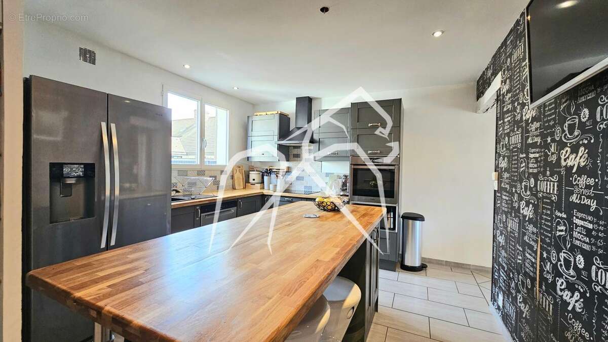 Maison de 122m²  Le Grand-Quevilly (76120) - photo 2