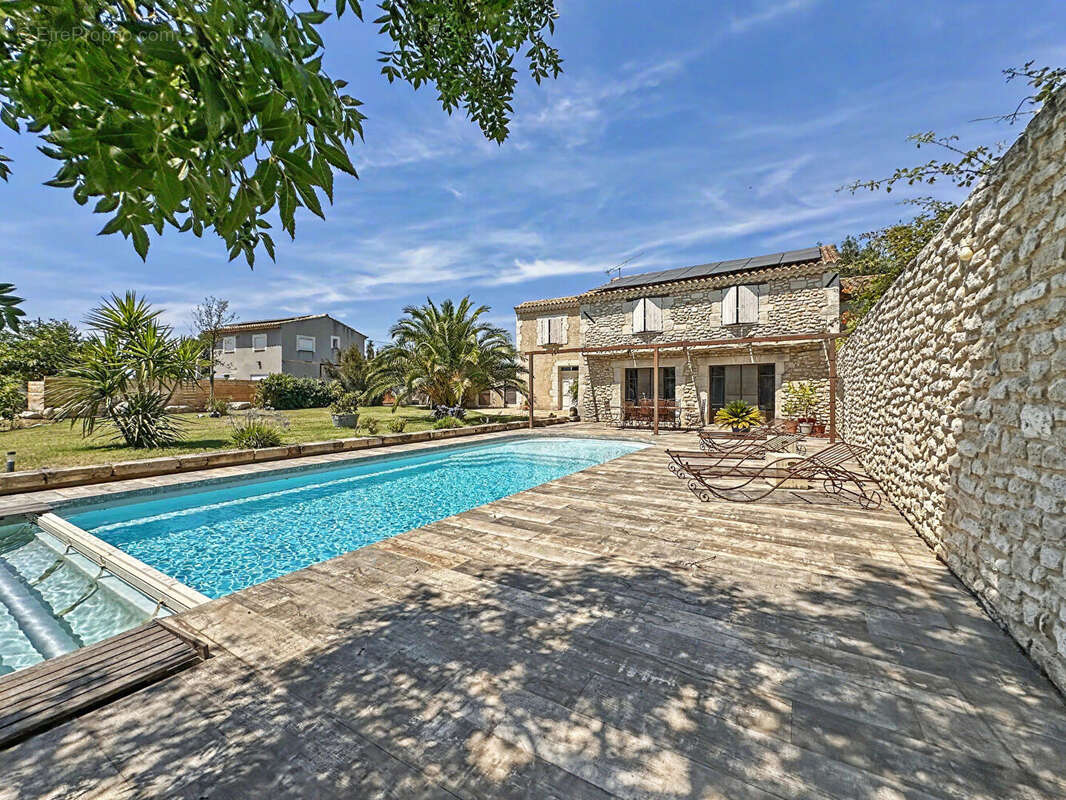 Maison de caractère avec gîte indépendant, piscine, garage et 5 000 m² à vendre à Moulès - photo 11