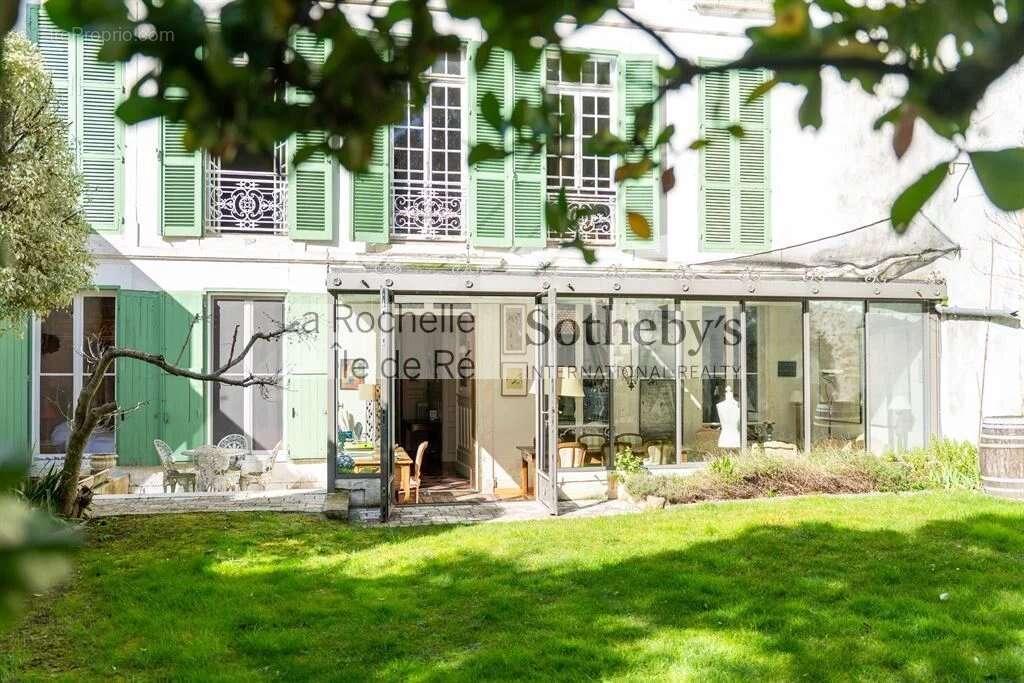Elégant Appartement de Charme avec Jardin - photo 2
