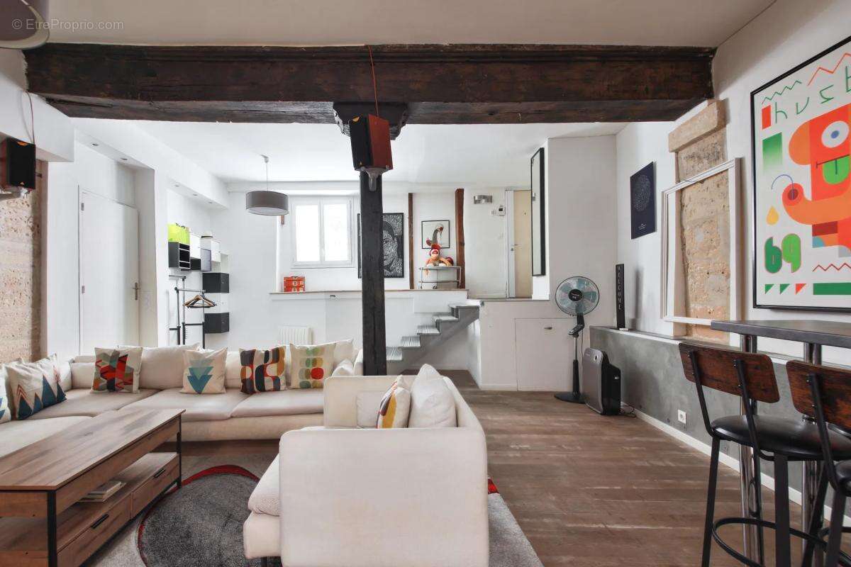Loft 87 m² Paris 4e - Charme et lumière - photo 4