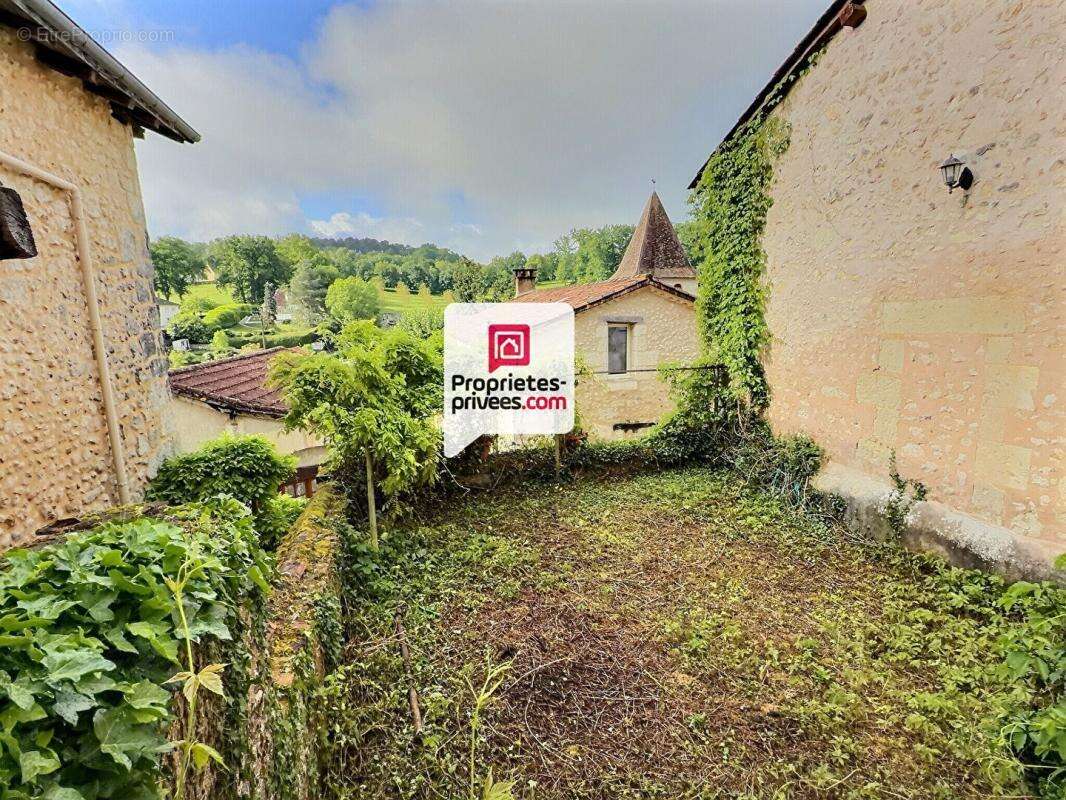 Maison T2/3 d'env. 98m² à réhabiliter en plein coeur du bourg de SAINT-AQUILIN (24110) - photo 11