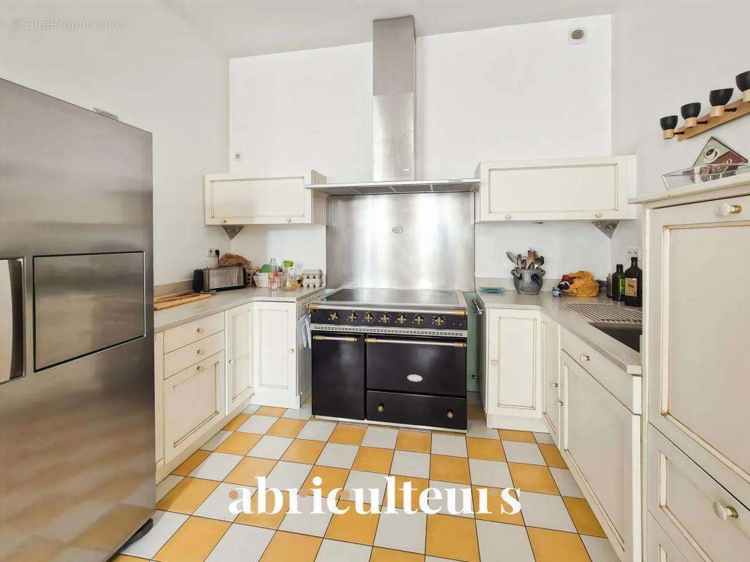 Duplex de caractère avec cheminée en vente à Saintes Centre (17100) - photo 3