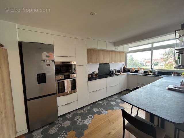 appartement F4 - centre ville - photo 3