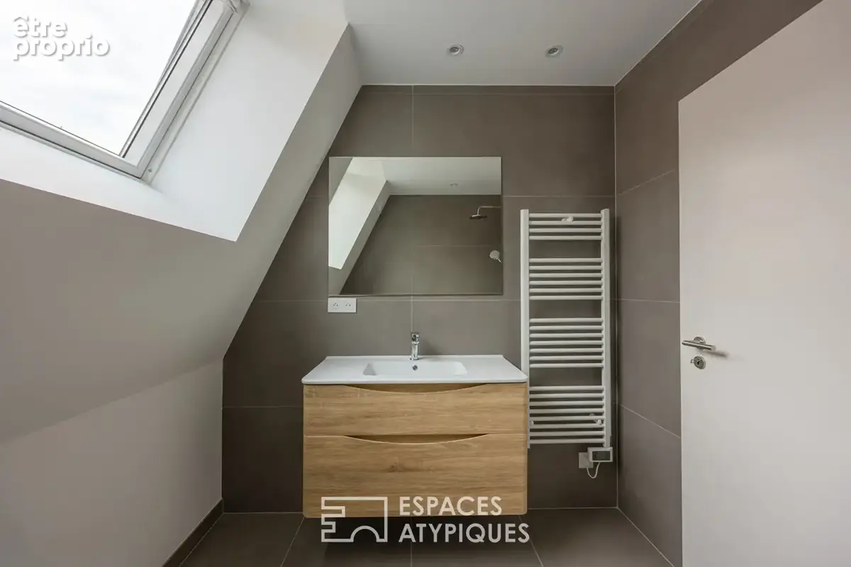 Loft contemporain en duplex et sa terrasse dans une ancienne friche industrielle - photo 10
