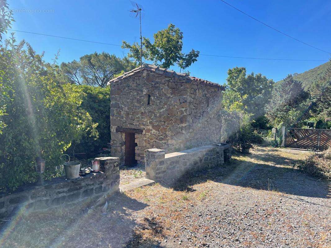 Mas en pierres mitoyen proche Anduze sur terrain constructible de 3300 m2 - photo 4