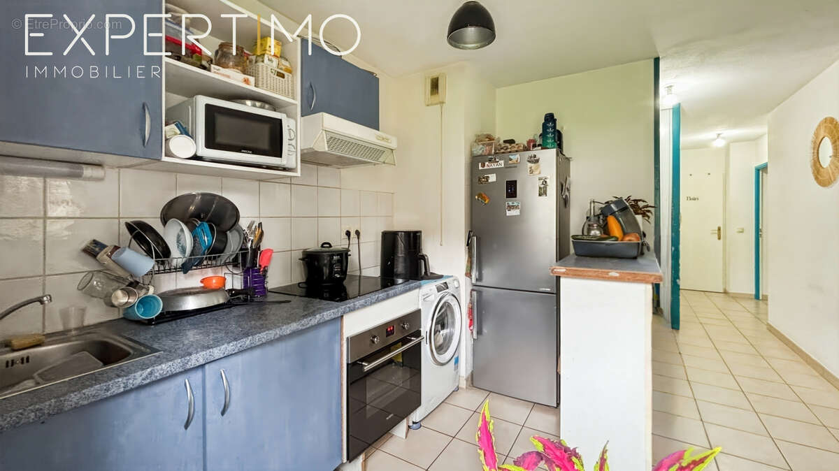 À vendre appartement F3 RDC avec terrasse et deux places de stationnement - photo 4