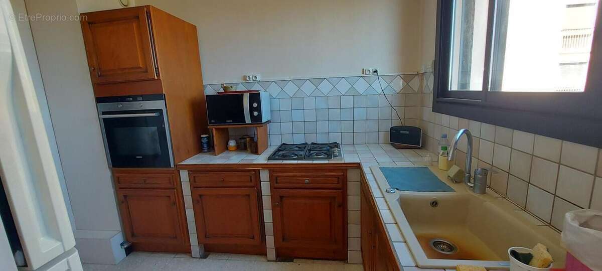 30. GARD. NIMES. Appartement traversant climatisé de 106 m² avec terrasse dans résidence sécurisée - photo 10