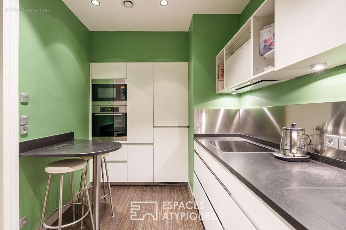 Appartement de charme rénové dans un immeuble de caractère - photo 8