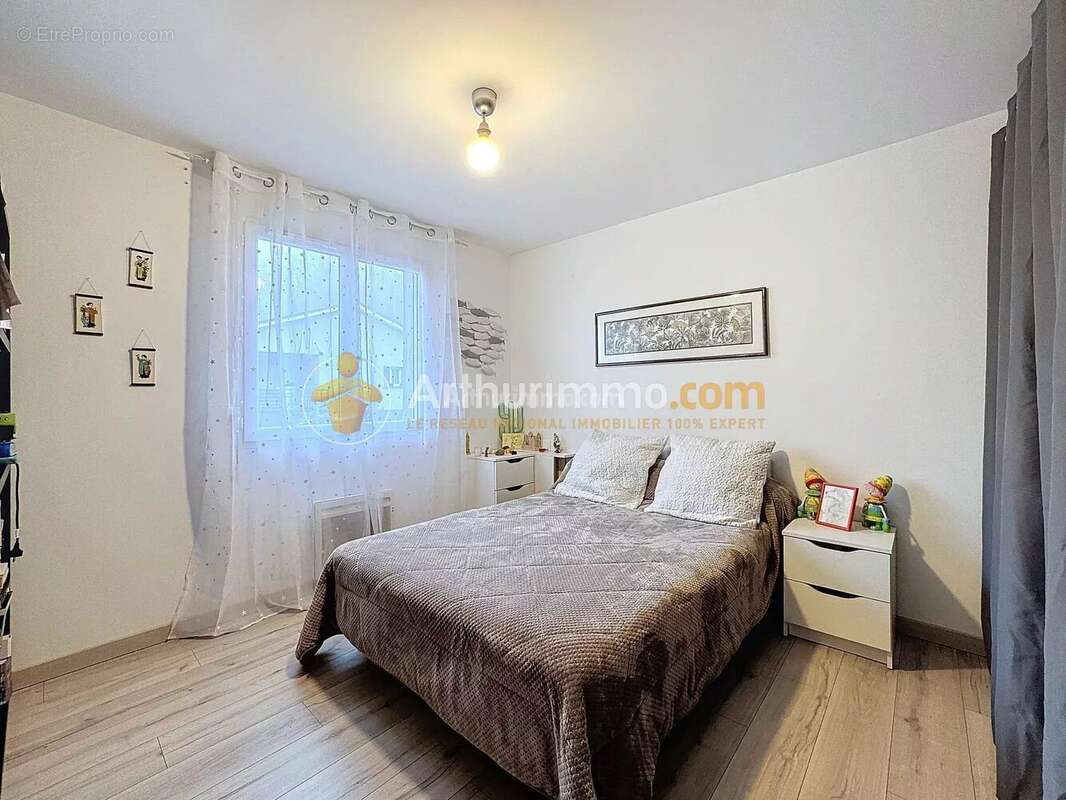 Maison à NIVOLAS-VERMELLE