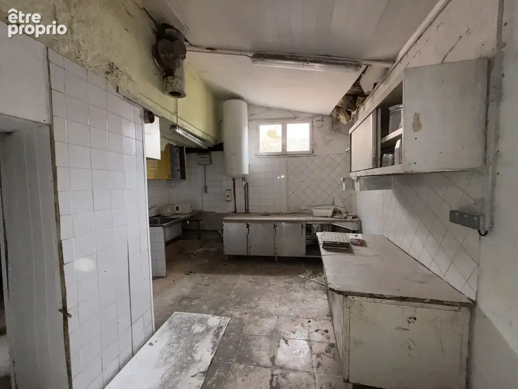 Immeuble à rénover au cœur de Villemontais - photo 6