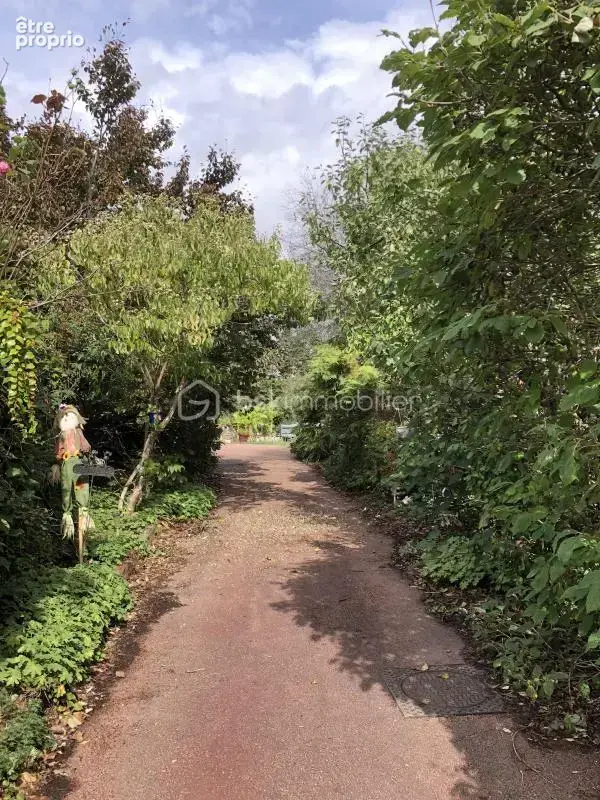 DEMEURE FAMILIALE D'EXCEPTION AU CŒUR DE COURCOURONNES Une bâtisse environ 190m2 habitable sur un écrin de verdure de 3 000 m² - photo 16