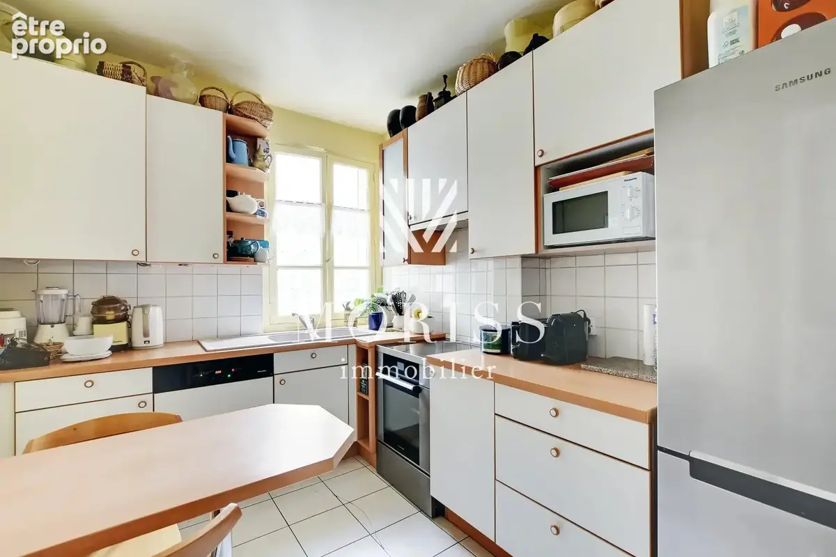 Appartement 5 piéces rue duhesme 75018 paris - photo 6