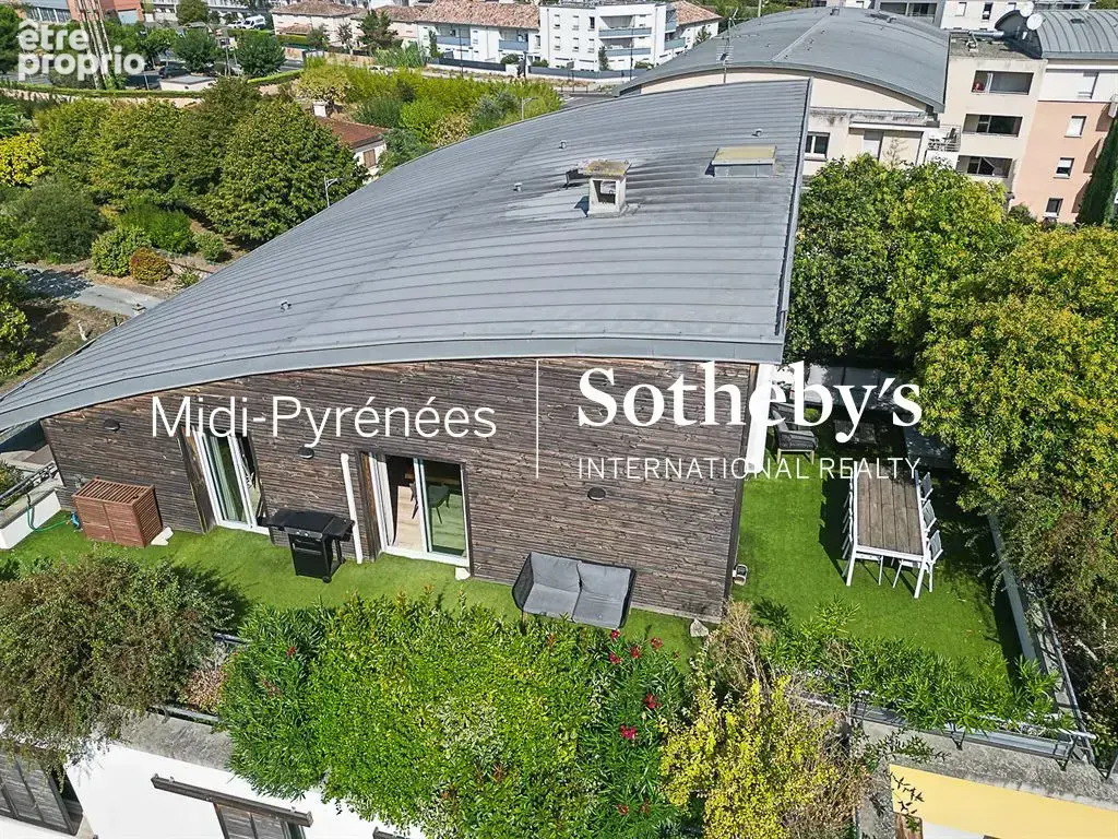 Une maison sur les toits - photo 2