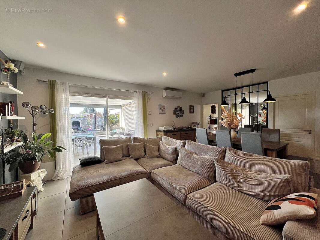 Maison 111 m² à Tignieu-Jameyzieu  - photo 5