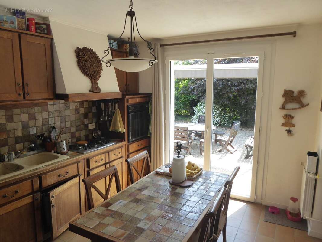 Maison sur grand terrain - photo 7