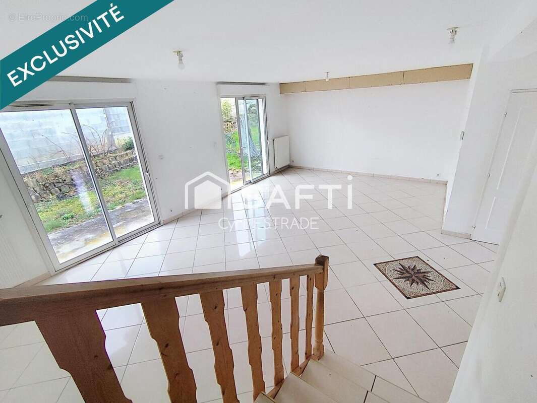 Photo 2 - Maison à SAINT-PAUL-EN-JAREZ