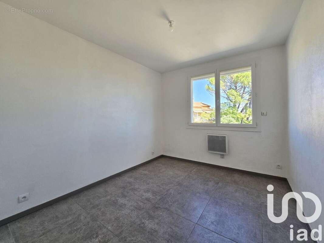 Photo 8 - Maison à LAUDUN-L&#039;ARDOISE