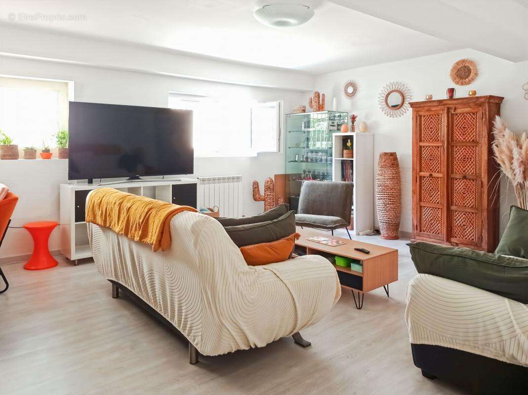 Maison à LAUDUN-L'ARDOISE