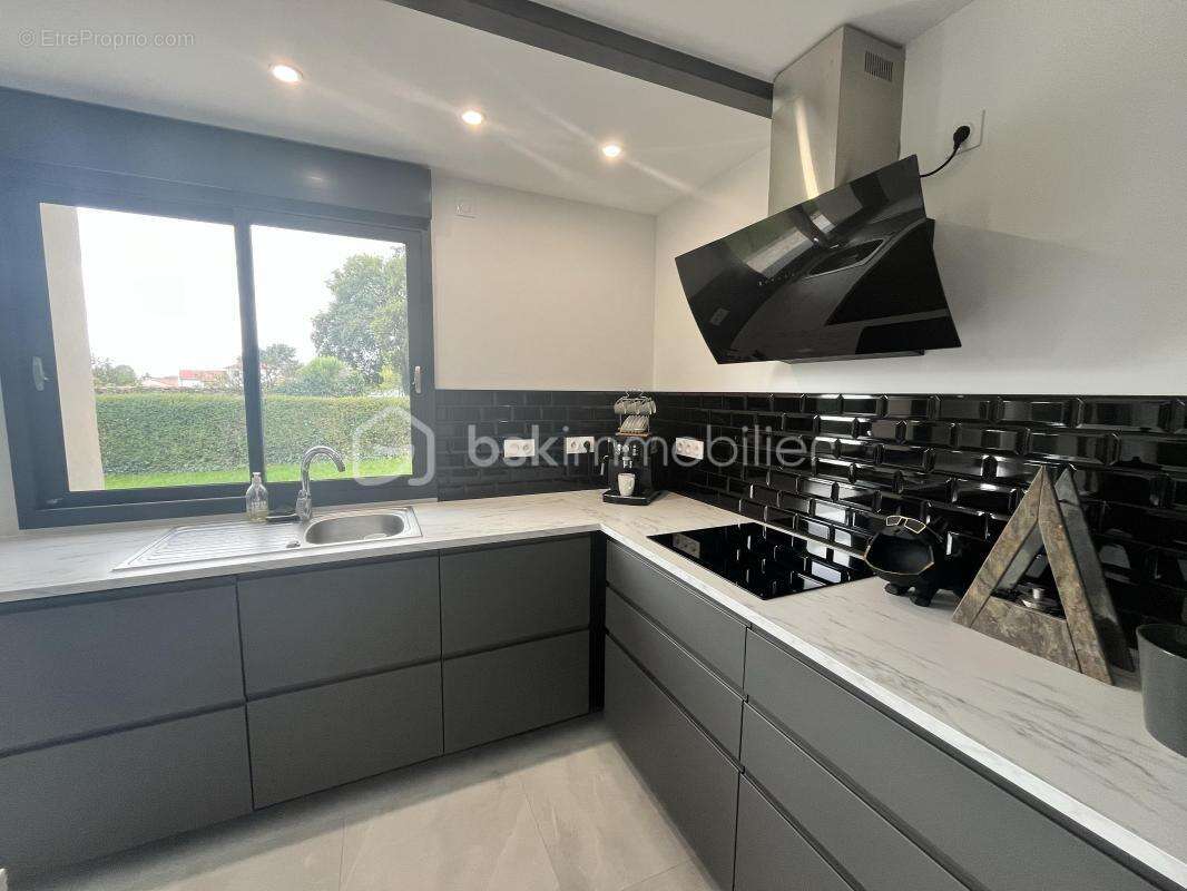 Maison à LA BOISSIERE-DU-DORE