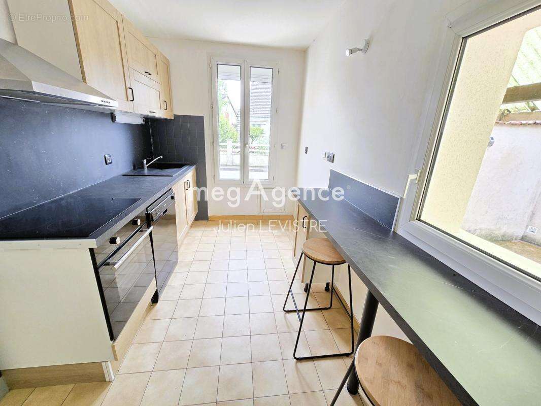 maison de 5 pièces de 122m² - photo 2
