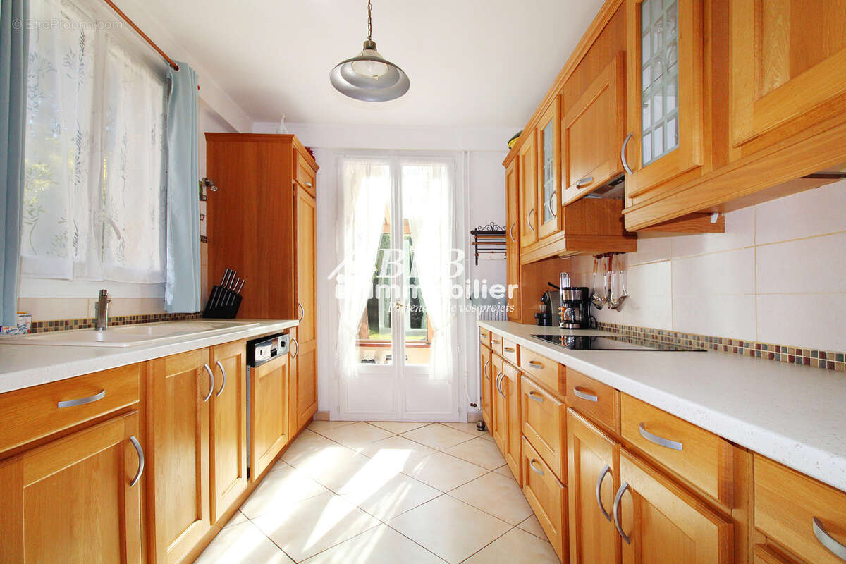 Maison de plain-pied 94m2  3 chambres + garage - photo 6