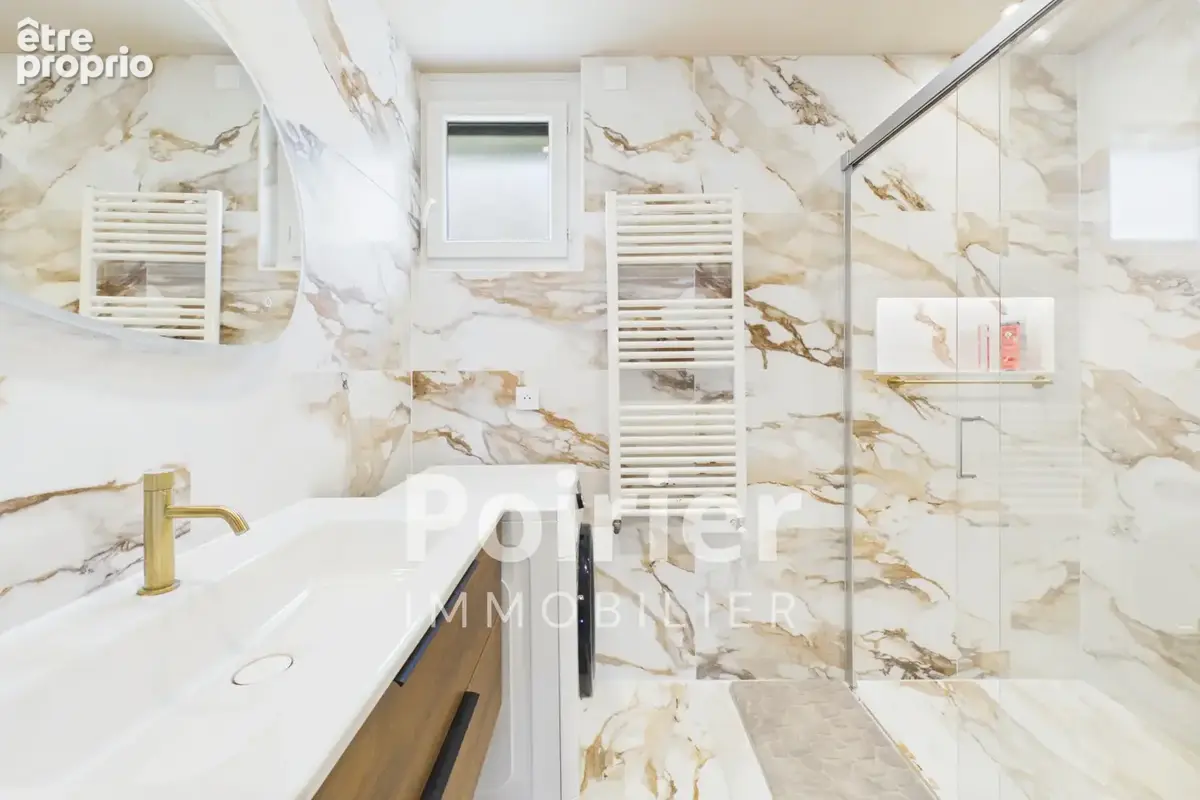 Appartement rénové de type 3 à EVIAN avec jardin vue lac et stationnements - photo 6