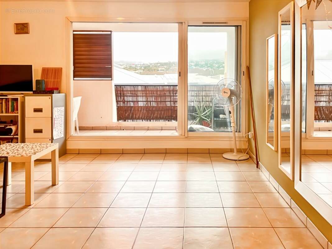  à vendre – t3 traversant avec double varangue – sainte-clotilde  - photo 6