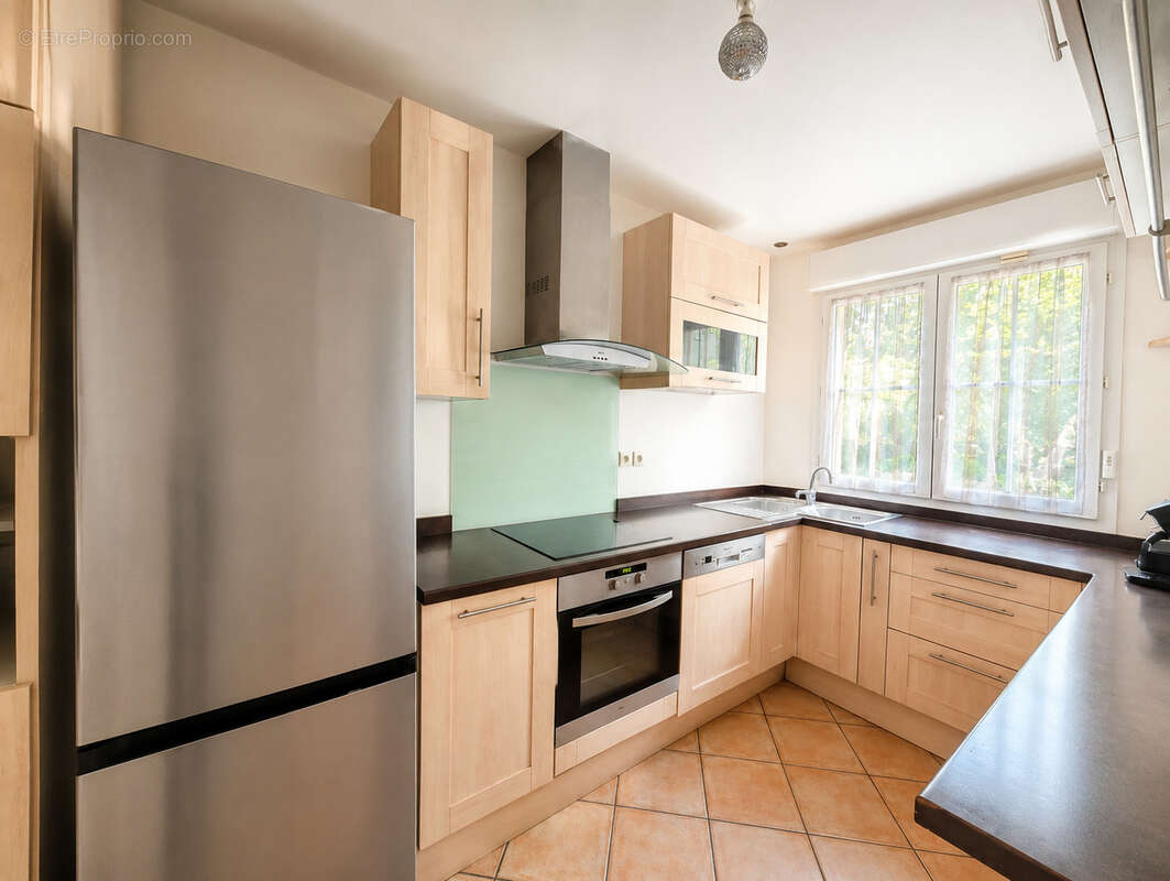 Maison 4 pièces de 100m2 avec 3 chambres et un jardin - photo 5