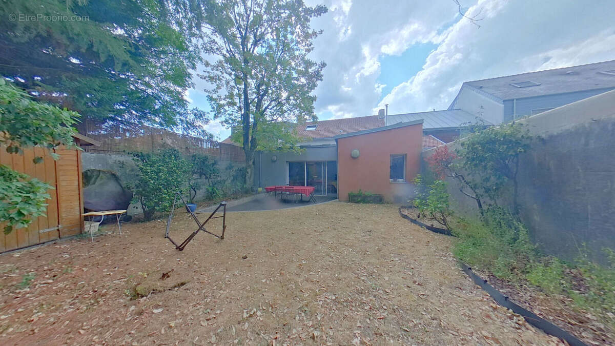 Maison familiale 8 pièces de 191 m2 à vendre au Rond-Point de Vannes - photo 8