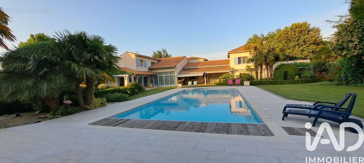 Photo 2 - Maison à SAINT-GERMAIN-DE-LUSIGNAN