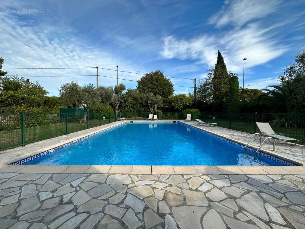 Dpt Alpes Maritimes (06), à vendre ANTIBES Appartement T3 65 m² – Rez-de-jardin, terrasse 40 m² et piscine - photo 16