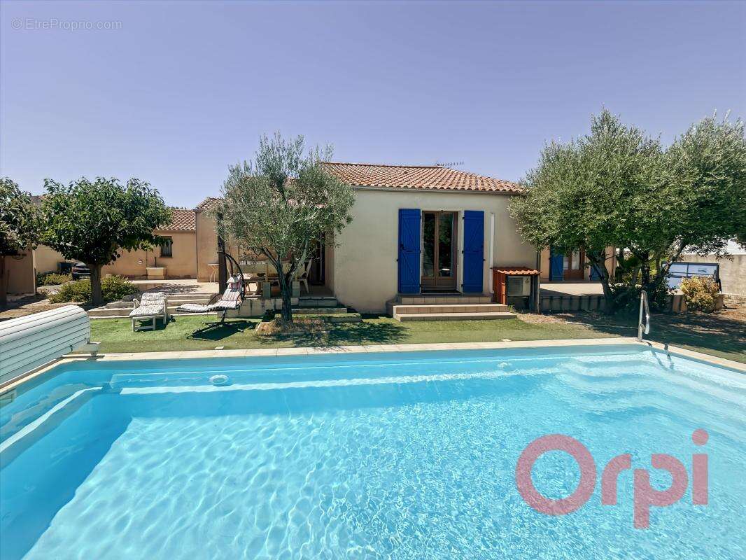 À Vendre : Villa familiale de plain-pied avec piscine, garage et grand jardin à Sauvian - photo 16