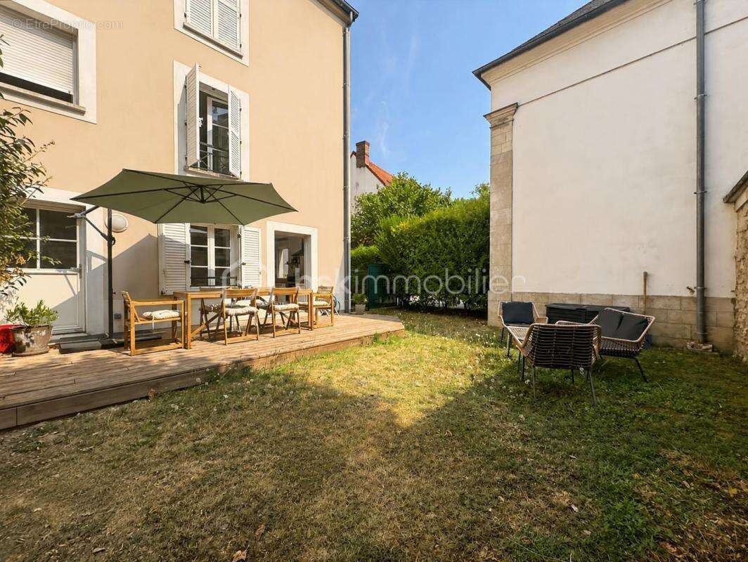 Superbe appartement avec jardin, cave et parking - photo 10