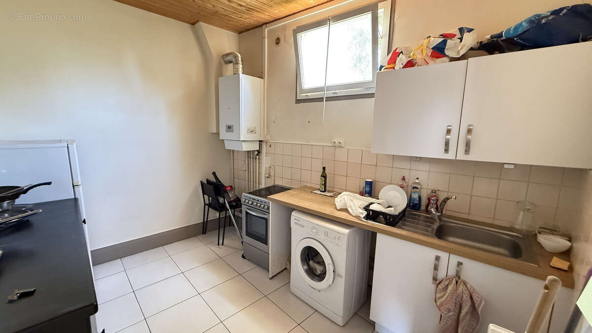 Investissement locatif à Vichy - Immeuble 3 appartements 4 garages - photo 20
