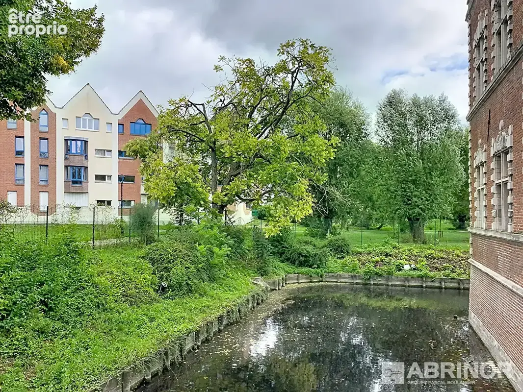 Appartement de 65.85 m² habitables - 2 chambres - SDB - Parking privatif - photo 13
