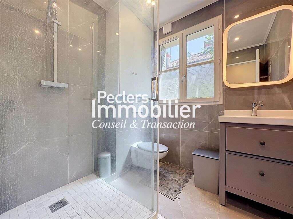 Appartement 3 / 4 pièces en rez de jardin dans un domaine privé d'exception. - photo 8