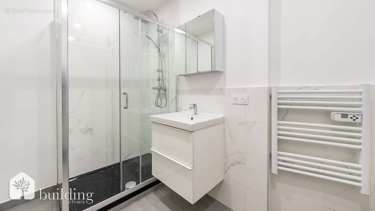Levallois-Perret Mairie - Appartement 2 pièces rénové avec charme de l'ancien de 52.01m² - photo 12