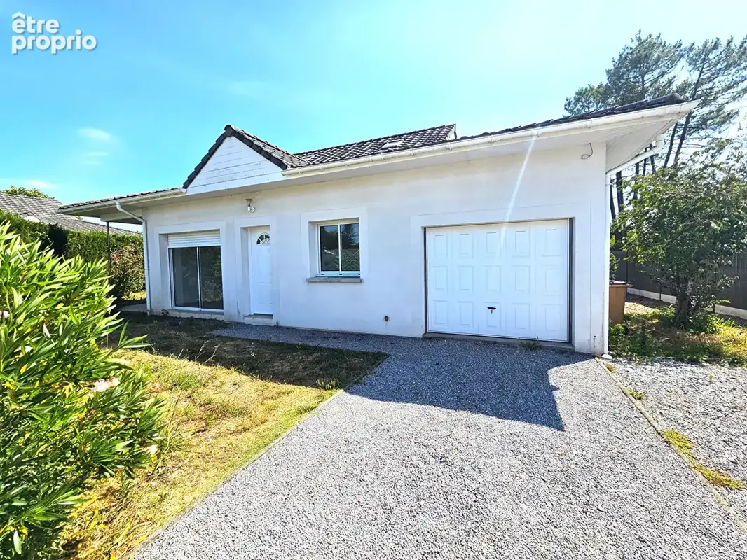 Maison 110 m²  avec 2 chambres, jardin et garage - photo 2