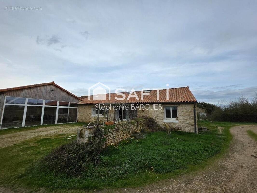 Photo 1 - Maison à SAINT-MAURICE-LA-CLOUERE