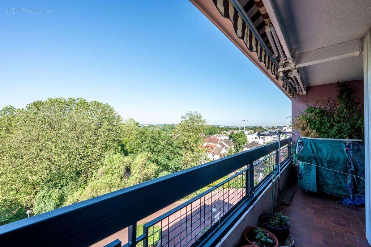 Appartement 5 pièces - 110 m² - balcon - boxes et parking sous-sol - photo 10