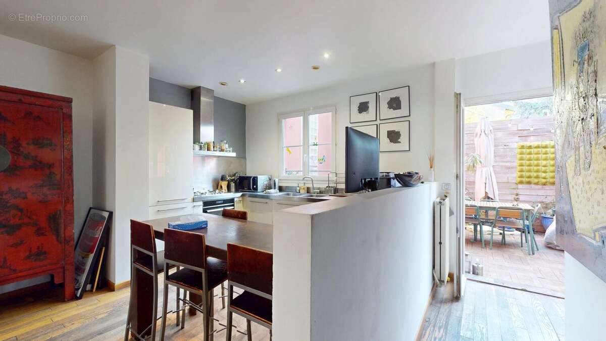 Maison 150 m² à Paris-19e  - photo 5