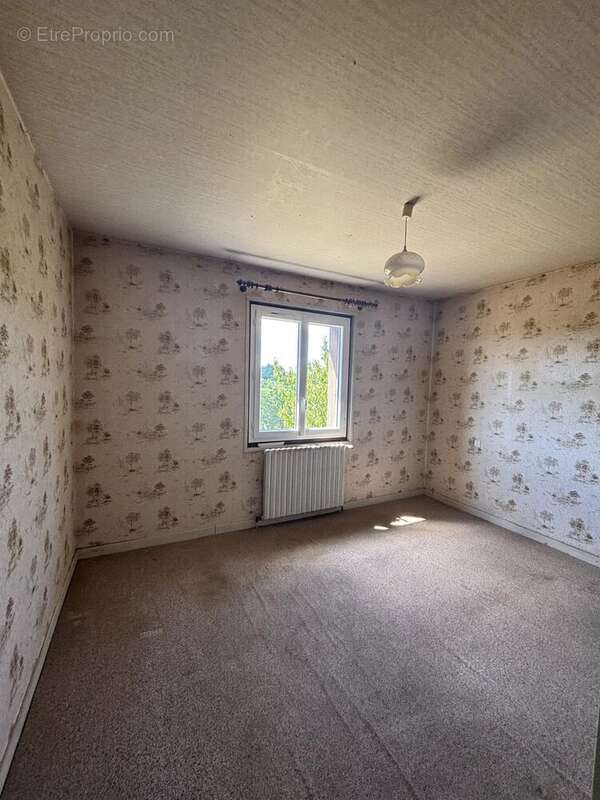 Maison de plain pied avec sous sol semi enterré - photo 7