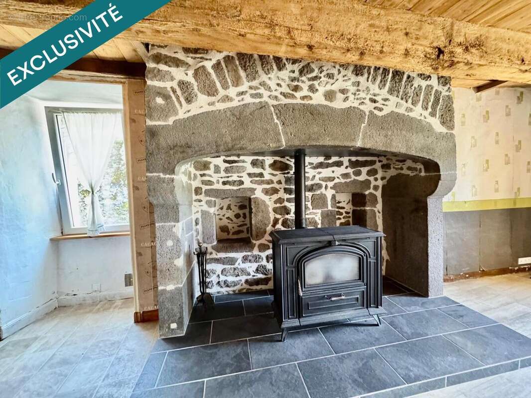 Photo 2 - Maison à LAQUEUILLE