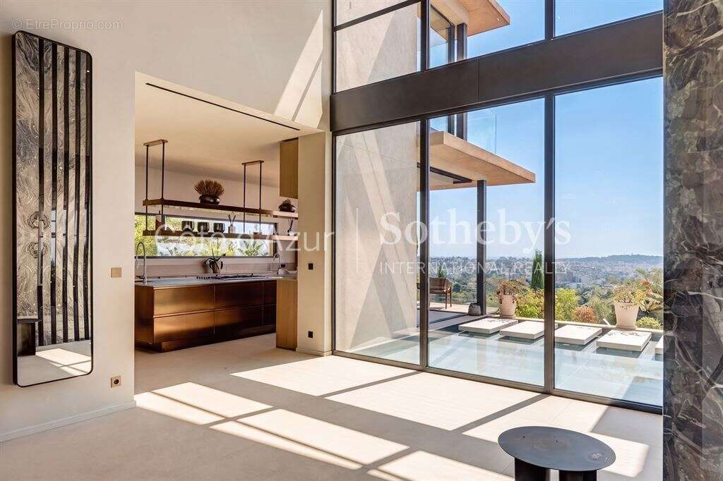 Vallauris, villa d'architecte contemporaine de 433 m² avec cinq suites, piscine miroir - photo 7