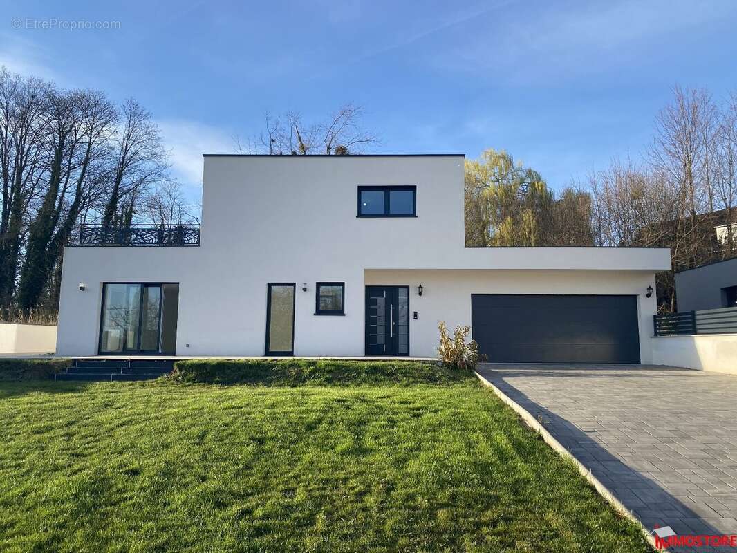 Maison à toit plat 6 pièces de 150m² - photo 3