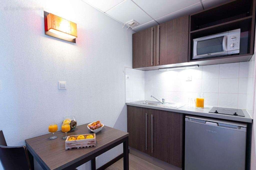 INVESTISSEMENT LOCATIF  NIMES  Résidence Zenitude Aparthotel Nimes Centre *** - 6.71% de rentabilité - photo 5